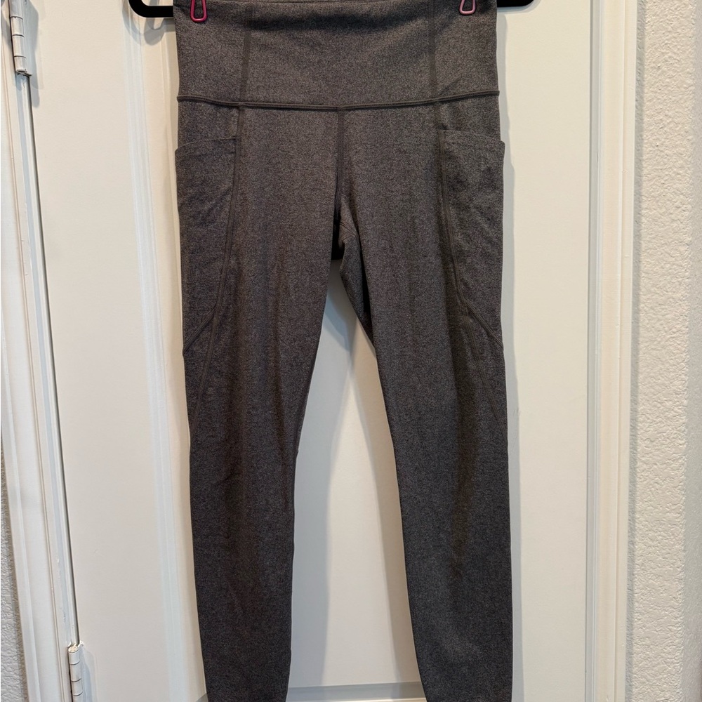 Athleta  Stash Pocket Salutation Tight Leggings
